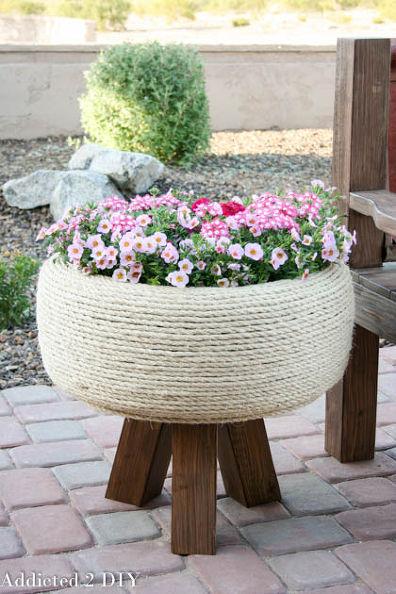 Recycled tire turned gorgeous planter.jpg