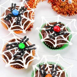 Fun halloween spiderweb cupcakes with chocolate spiders.jpg