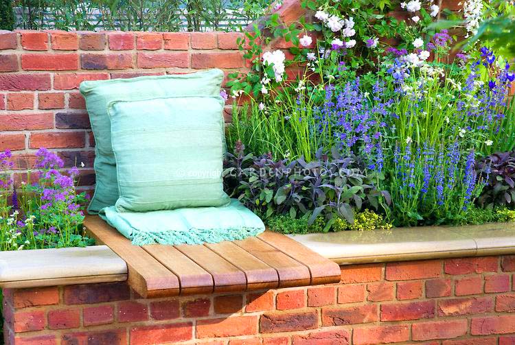 Brick flower bed with seat.jpg