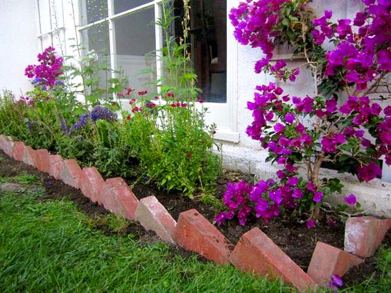Inclined bricks flower bed.jpg