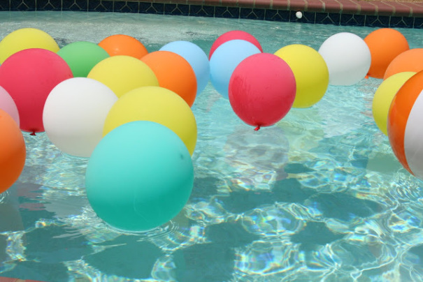 Pool party balloons in pool.jpg