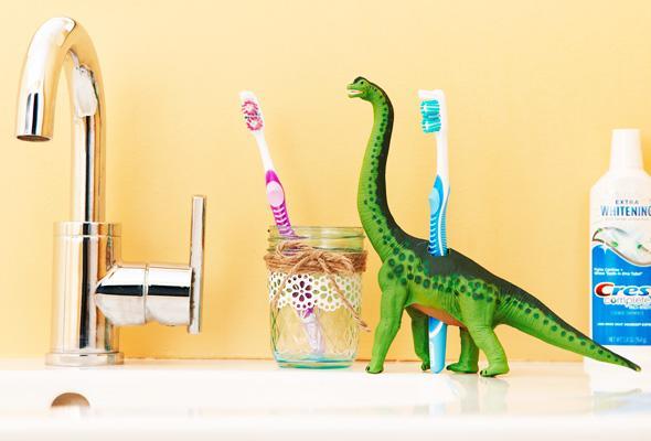 Repurpose unused toys as toothbrush holder.jpg